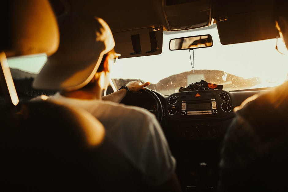 young man driving car